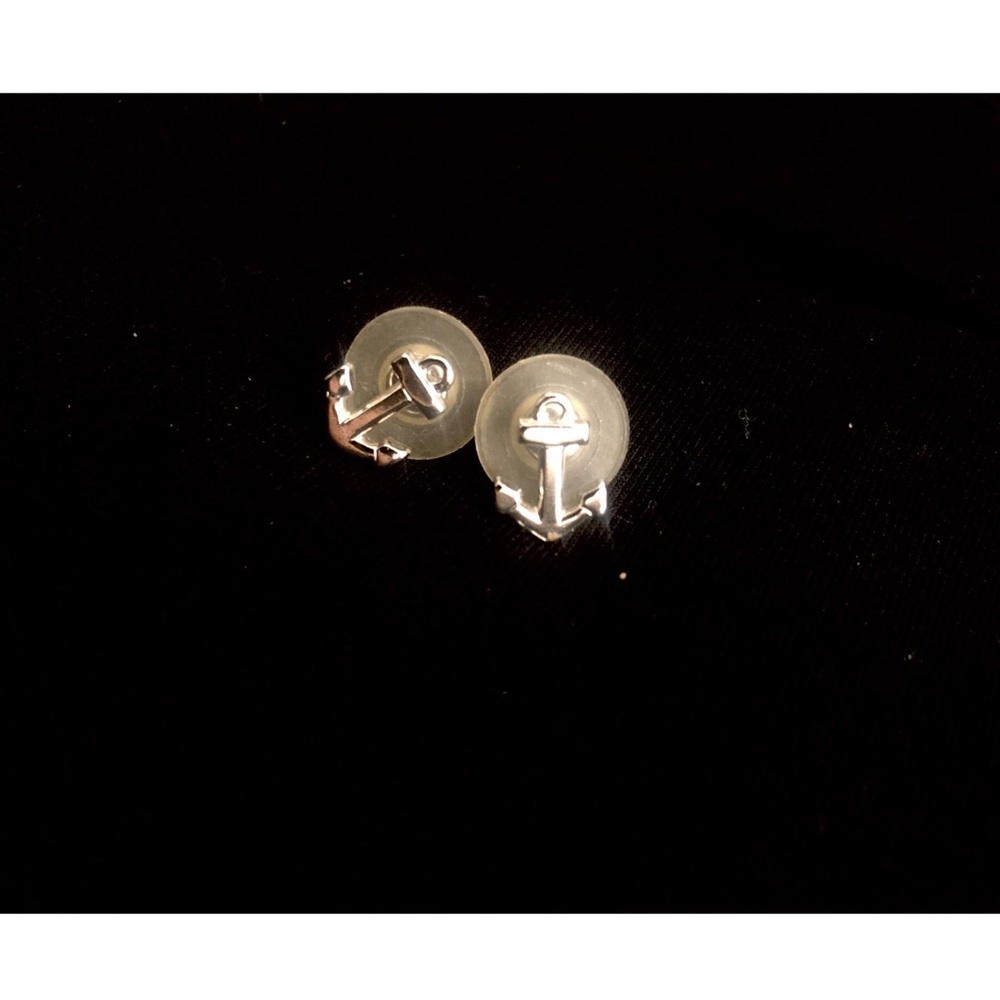 Nautical silver anchor earrings.